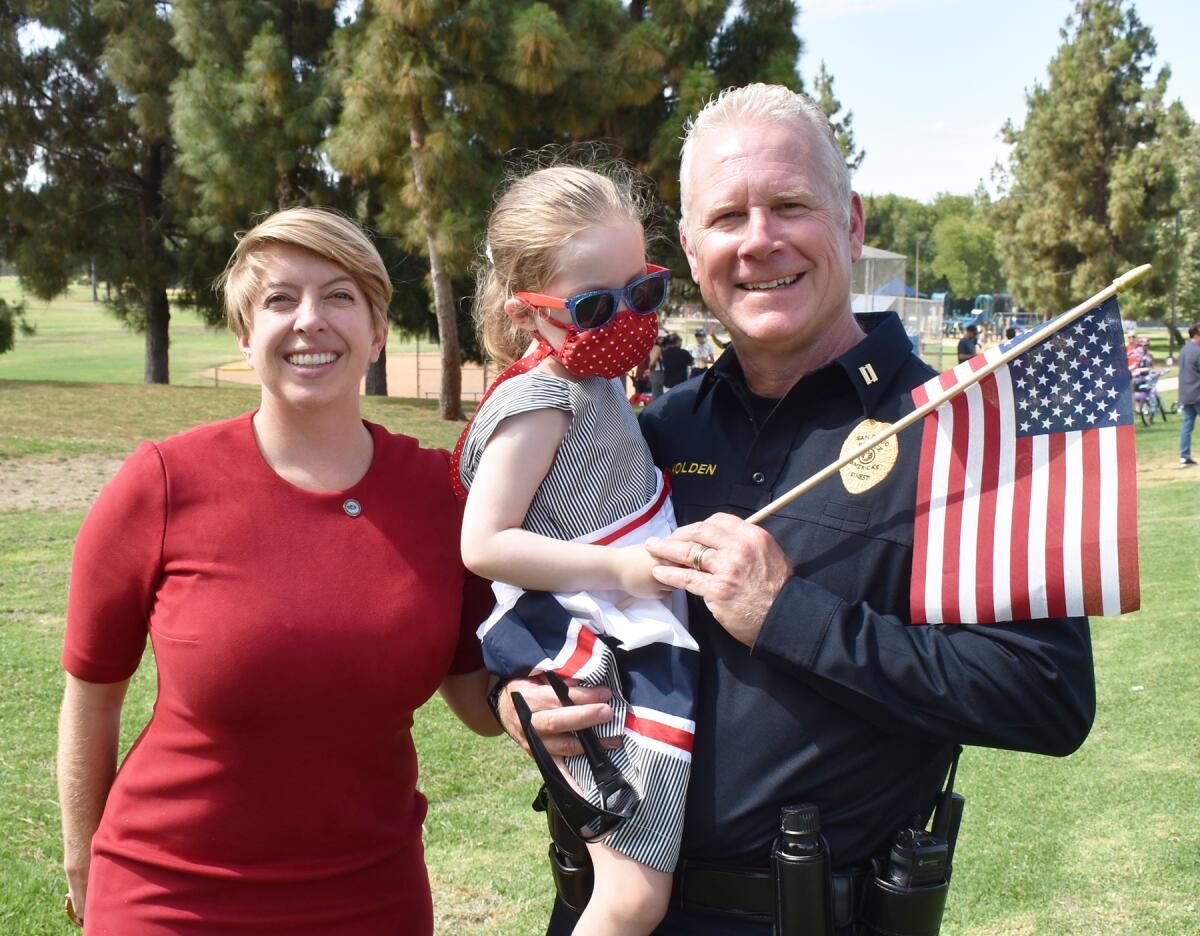 San Diego City Councilwoman Marni von Wilpert, Paisley Huezo and her grandfather, San Diego Police Capt. Mike Holden.