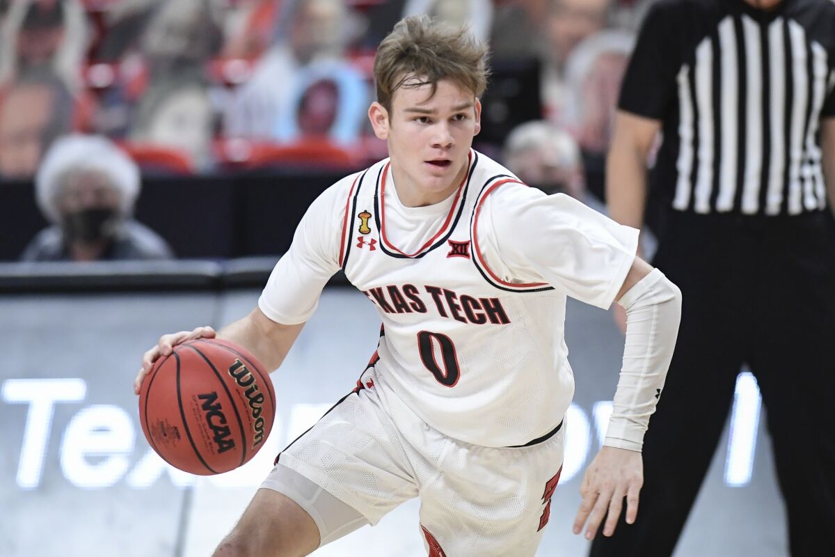Texas Tech's Mac McClung controls the ball against Iowa State on March 9.