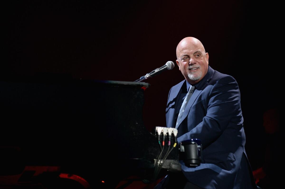 Billy Joel performs during the final show at Nassau Coliseum on Aug. 4 in Long Island, New York.