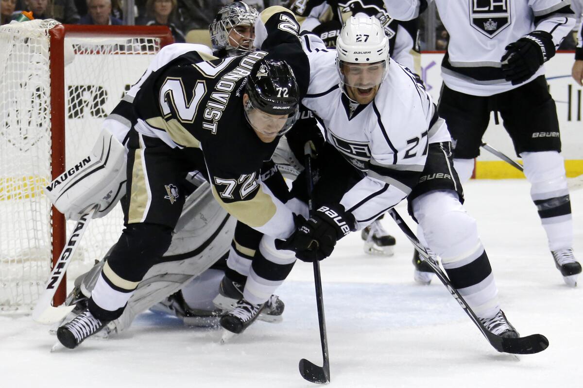 Pittsburgh's Patric Hornqvist and the Kings' Alec Martinez battle for position Thursday night in Penguins' 3-0 win.