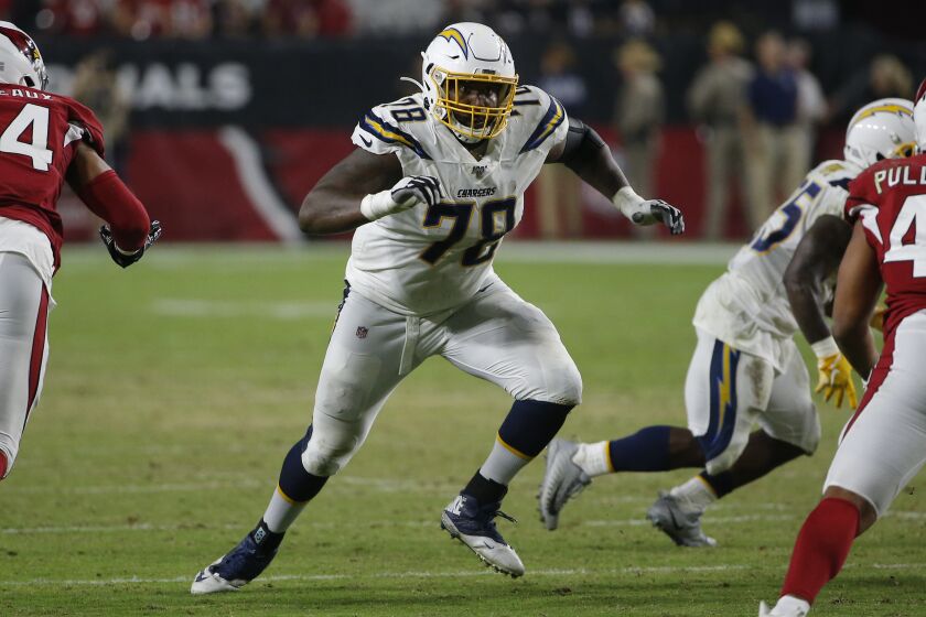 Los Angeles Chargers offensive tackle Trent Scott (78) lines up against the Arizona Cardinals during the second half of an NFL preseason football game, Thursday, Aug. 8, 2019, in Glendale, Ariz. (AP Photo/Rick Scuteri)