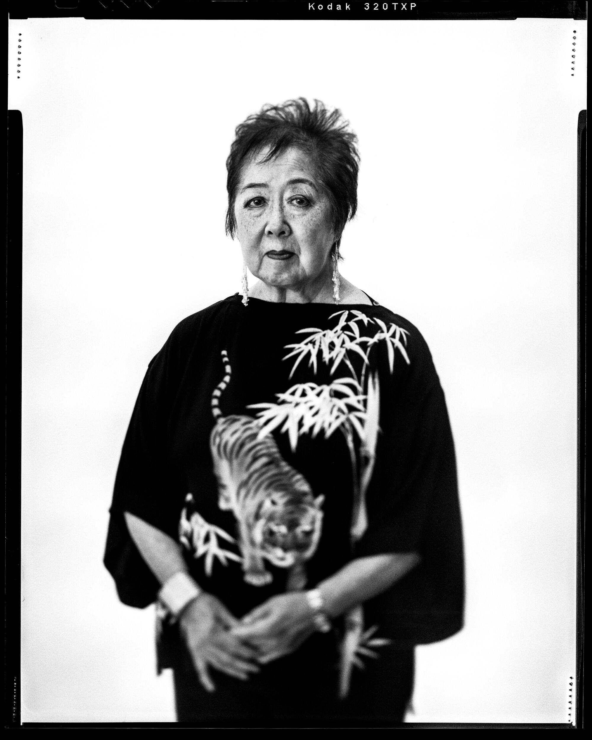 Miya Iwatak is photographed wearing a dress her aunt made from a recycled vintage kimono.