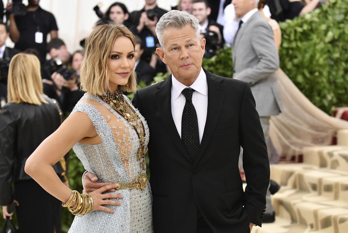 Katharine McPhee, left, and David Foster pose in formalwear at the Met Gala