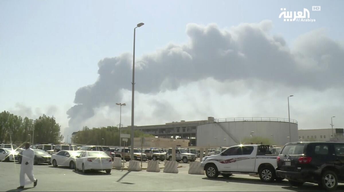 Smoke from a fire at the Abqaiq oil processing facility rises in Saudi Arabia, in this still from a video broadcast Sept. 14 on Al-Arabiya satellite news channel.