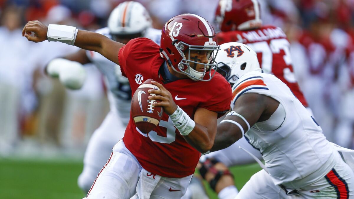 Former Alabama quarterback Tua Tagovailoa (13) have cleared all his medical hurdles which should cement him as a Top 5 pick in the upcoming NFL Draft.