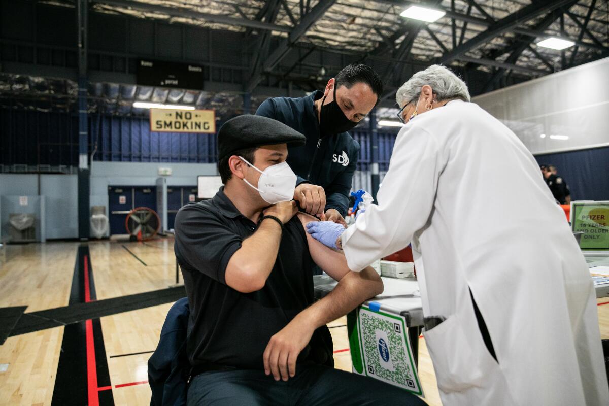 First dose of the Pfizer COVID-19 vaccine.