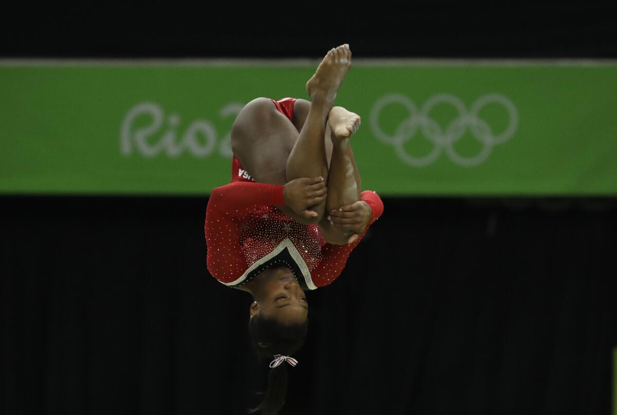 Simone Biles performs on the balance beam at the Rio de Janeiro Olympics on Monday.