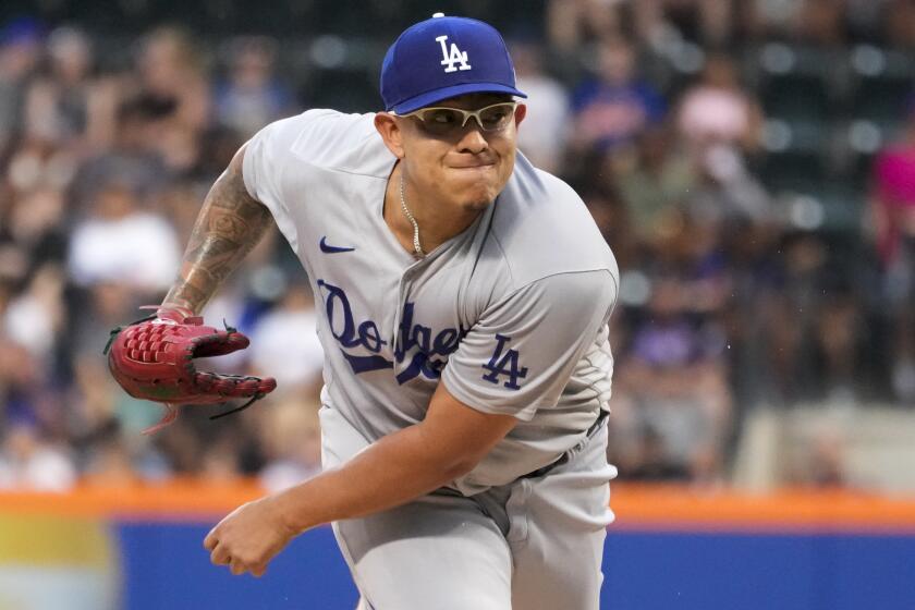 Los Angeles Dodgers pitcher Julio Urias delivers against the New York Mets.