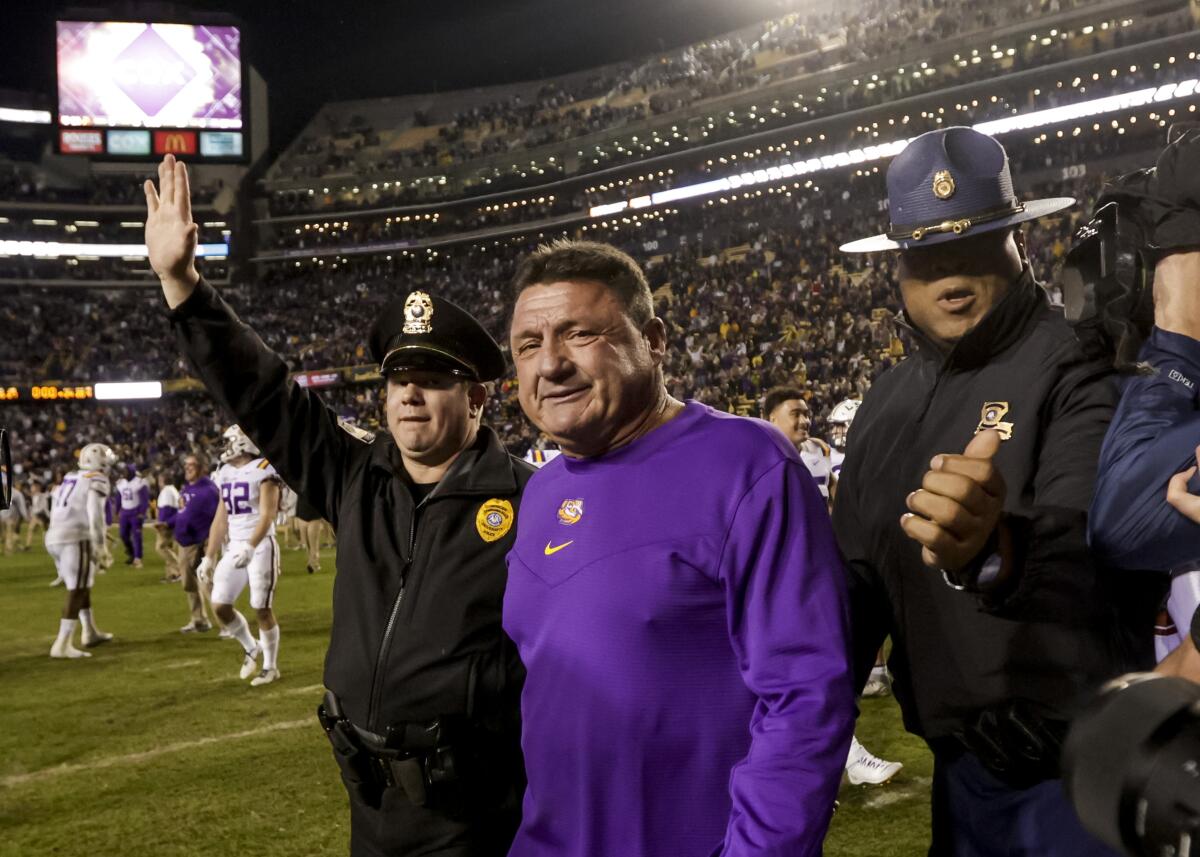 LSU coach Ed Orgeron reacts after a 27-24 win against Texas A&M on Nov. 27, 2021.