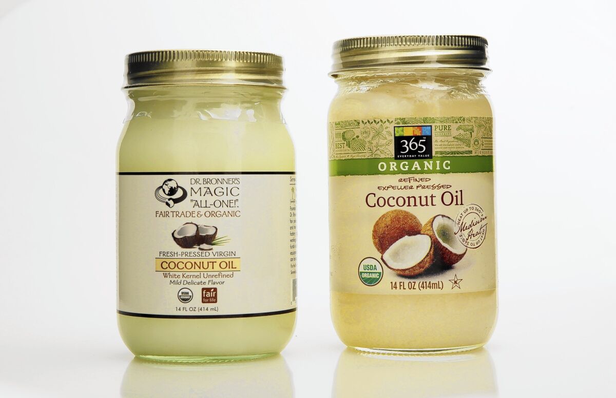 Coconut oil came under criticism for its high level of saturated fat. But new studies show benefits in health and beauty uses.