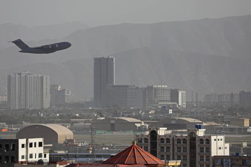 TOPSHOT - A US Air Force aircraft takes off from the military airport in Kabul on August 27, 2021, as the Pentagon said the evacuation of tens of thousands of people from Afghanistan still faces more possible attacks like the bombing that killed scores of people outside the Kabul airport. (Photo by - / AFP) (Photo by -/AFP via Getty Images)