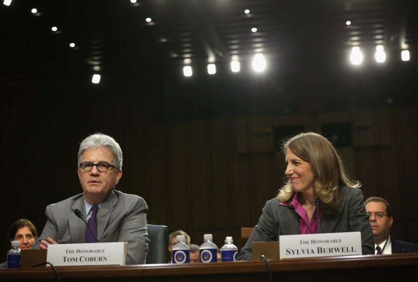 Sen. Tom Coburn (R-Okla.) introduces Sylvia Mathews Burwell at her confirmation hearing before the Senate Finance Committee.