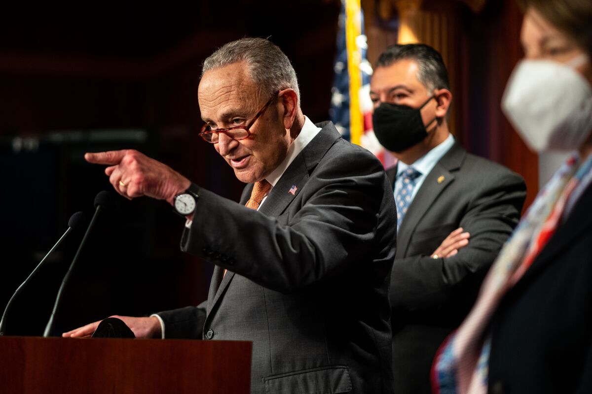  Senate Majority Leader Chuck Schumer speaks and points during a news conference on Capitol Hill on  Jan. 4,