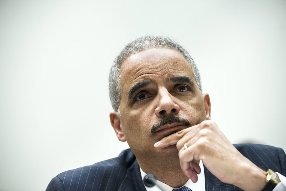 The U.S. Justice Department's inspector general criticized the department's prosecutions of mortgage-fraud cases, a report released Thursday said. It said that during a 2012 press conference, Atty. Gen. Eric H. Holder, above, cited faulty statistics to overstate enforcement actions.