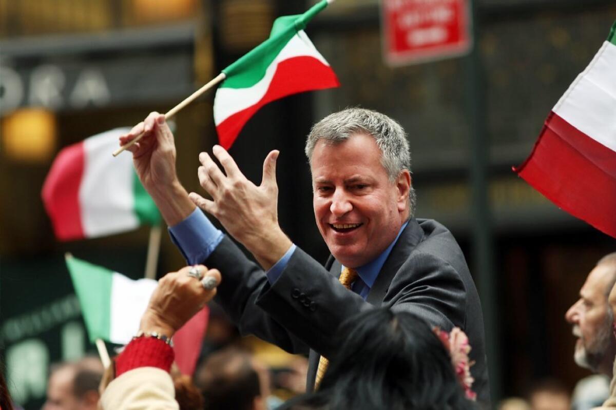 New York Mayor Bill de Blasio takes part in the city's annual Columbus Day parade on Monday.
