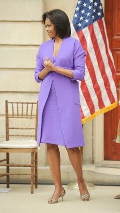 Michelle Obama wore purple Isaac Mizrahi when she cut the ribbon for the Metropolitan Museum of Art's renovated American Wing.
