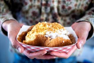 NORTH HOLLYWOOD, CA - MAY 29: Mango and coconut gelato from Moom Maam at the Wat Thai Temple weekend market on Sunday, May 29, 2022 in North Hollywood, CA. After a long hiatus the food market is back, offering an array of Thai cuisine from numerous vendors. (Mariah Tauger / Los Angeles Times)