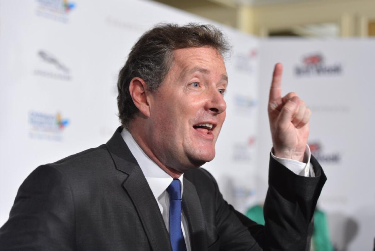 Piers Morgan may be out of his 9 p.m. weeknight show, but the British host says he'd "love to" stay at CNN.