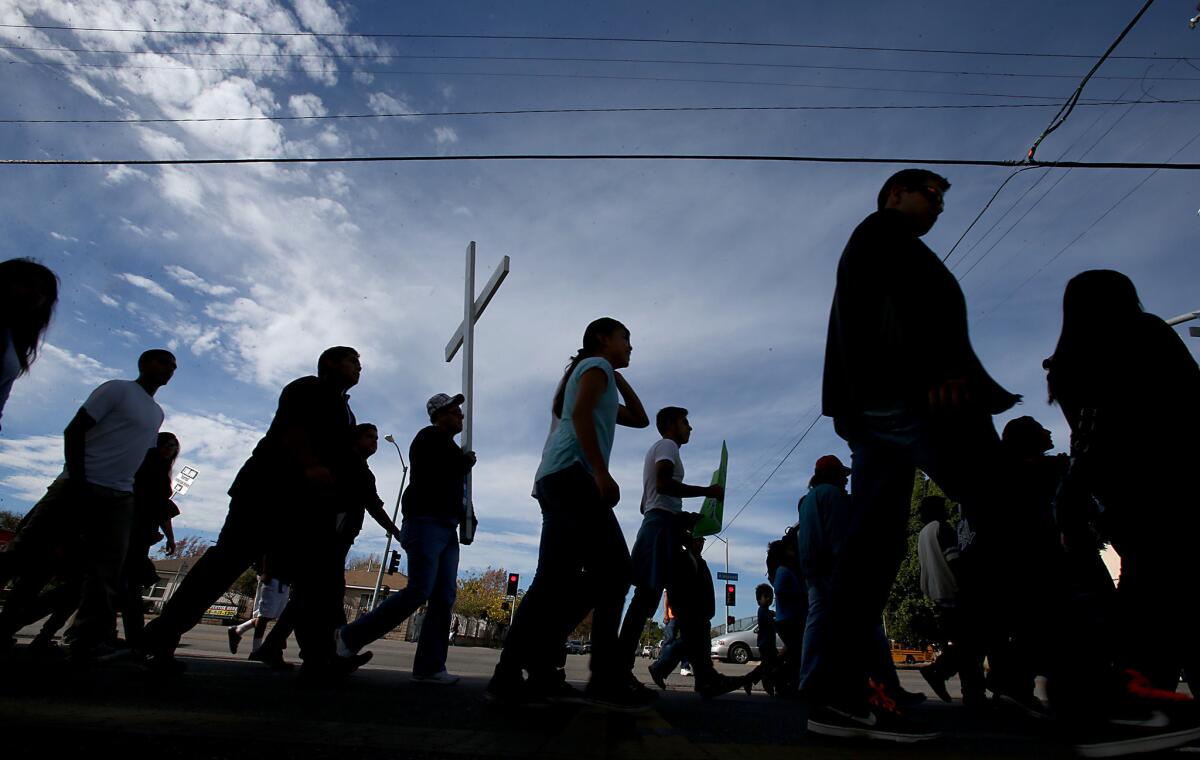 About 200 people walked the streets of the San Fernando Valley during an immigration reform march and rally on Nov. 27. A new study shows that immigrants are less prone to violence and "antisocial" behaviors than native Americans.