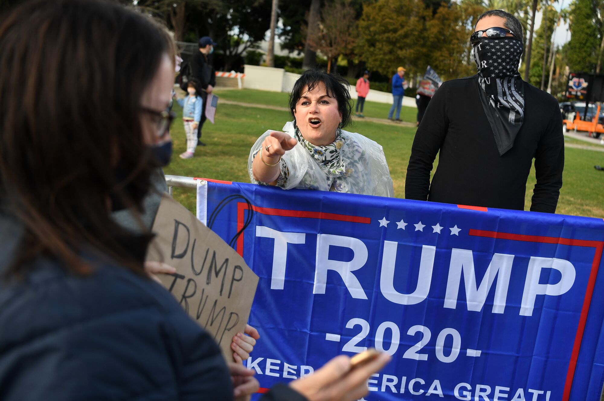 A Trump supporter yells at a rival protester during a rally for the president in Beverly Hills on Saturday.
