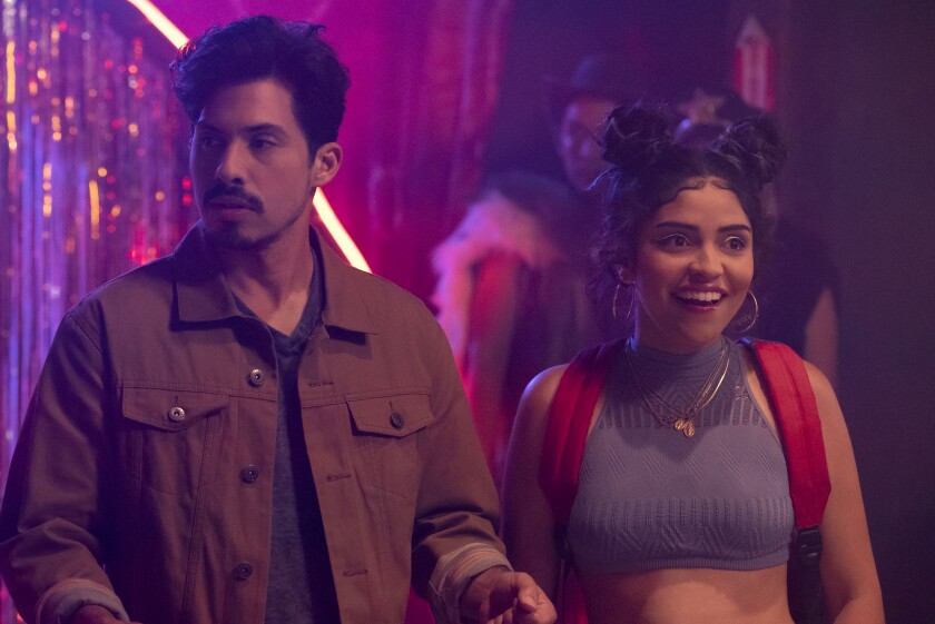 Carlos Santos and Karrie Martin in a scene from "Gentefied."