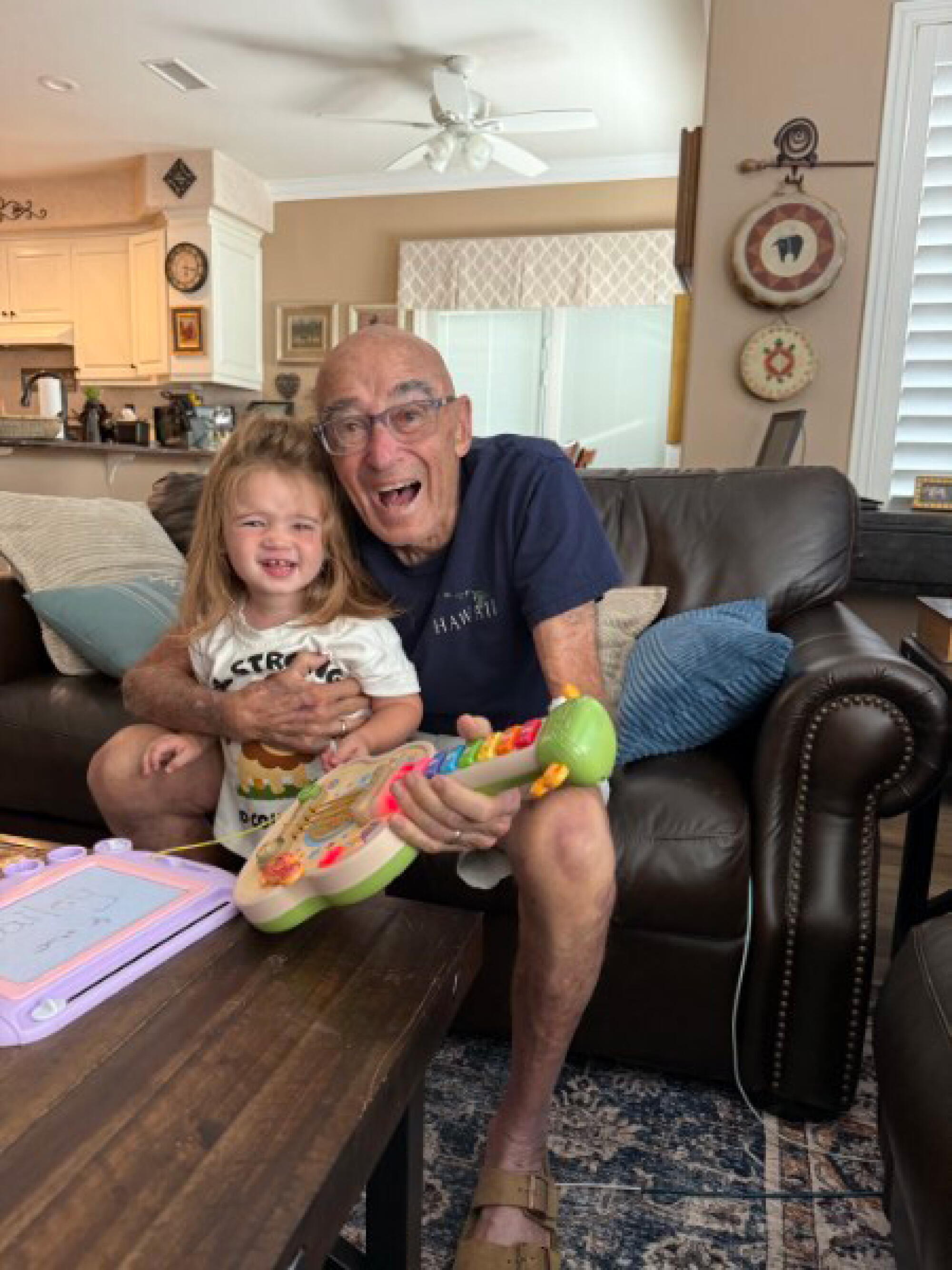 Ross Newhan shares a happy moment with his great granddaughter, Bailey, earlier this year.