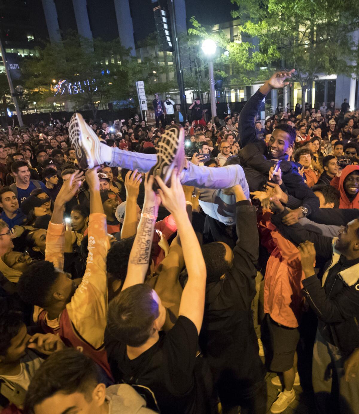 Fans celebrate in the streets of Toronto after the Raptors wrapped up the championship.