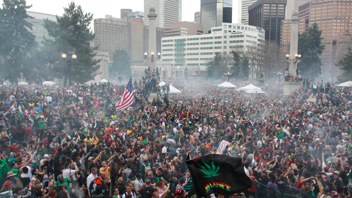 Thousands of people gather at a pro-marijuana rally in Denver's Civic Center Park in 2013. Denver police have said they would potentially use social media tracking software to monitor the annual gathering.