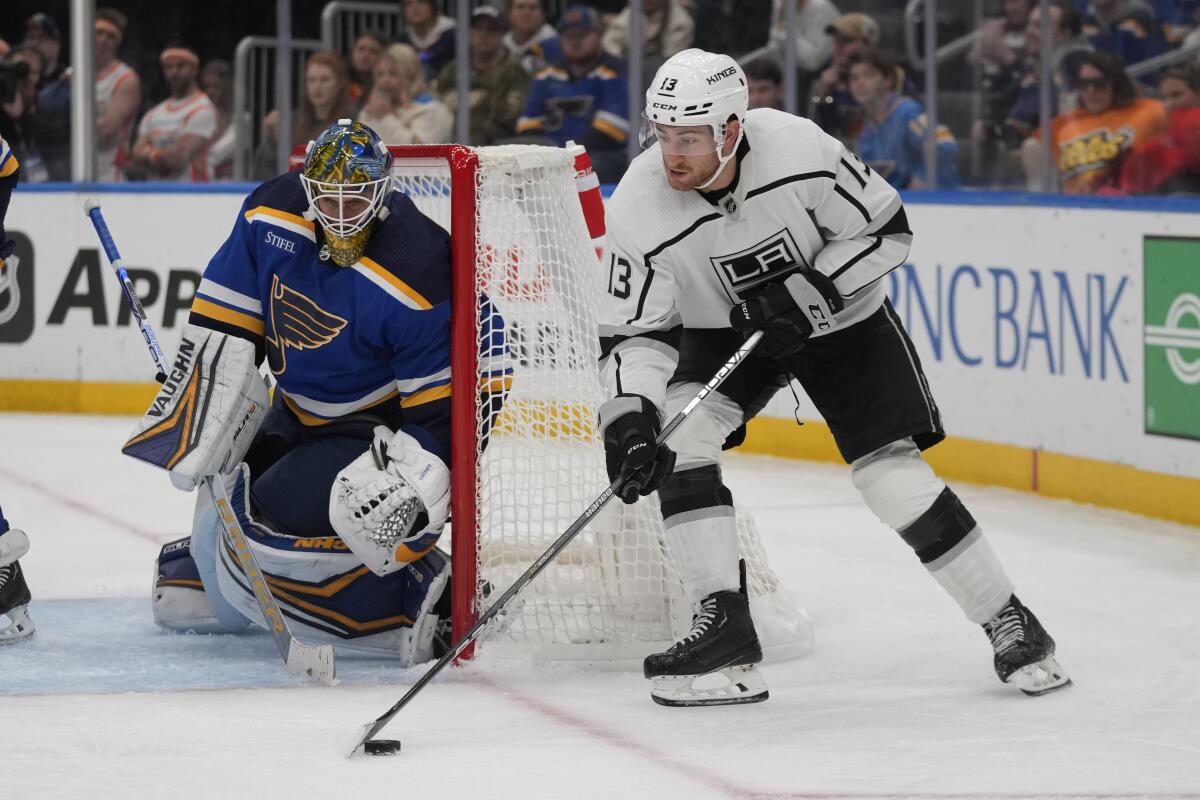 A  goaltender crouches as the Kings' Gabriel Vilardi sweeps in from the side of the net.