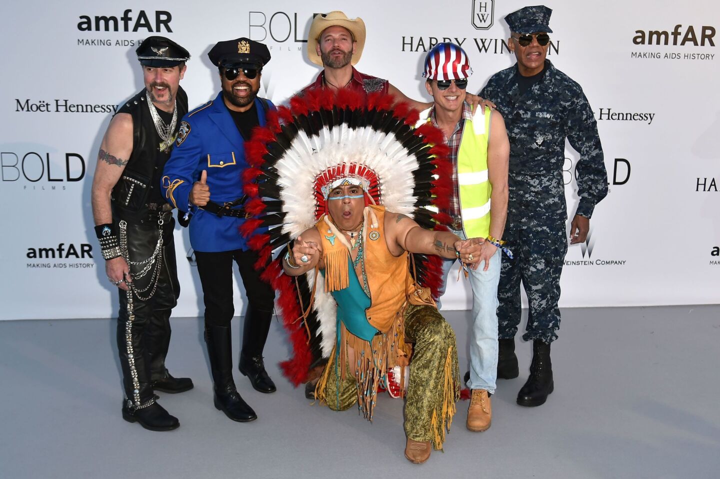 Eric Anzalone, front, Ray Simpson, Jim Newman, Felipe Rose, Bill Whitefield and Alex Briley of the band Village People pose as they arrive for the amfAR's 23rd Cinema Against AIDS Gala.