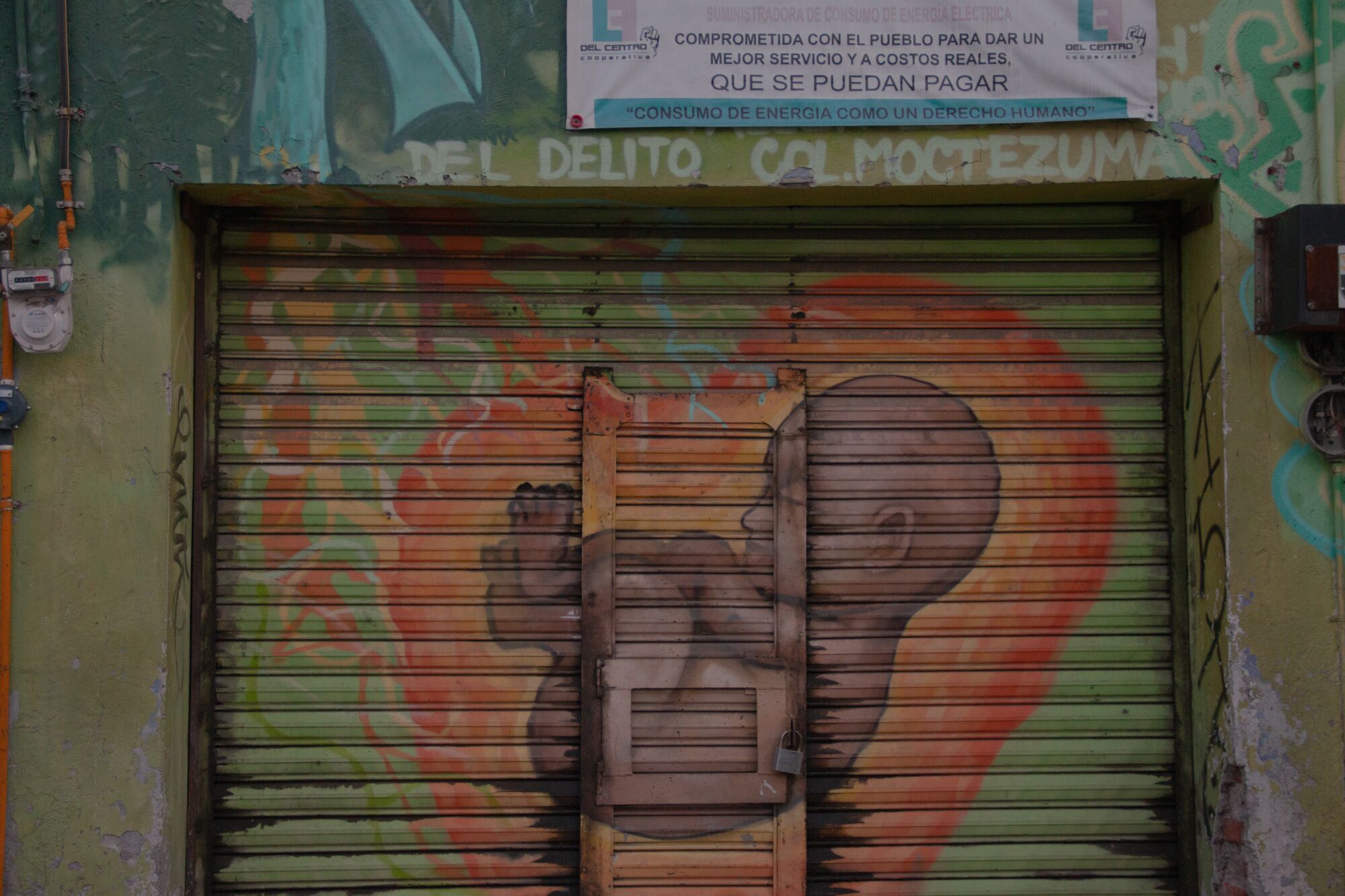 Graffiti in Mexico City shows a fetus in utero.