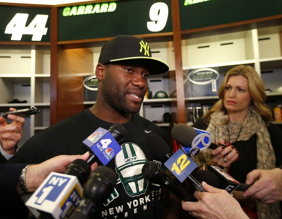 David Garrard speaks to reporters at the Jets training camp this month.