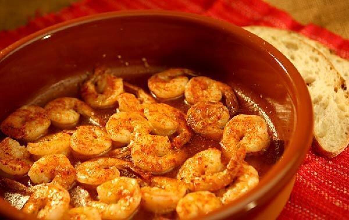 Sizzling shrimp with garlic and hot pepper.