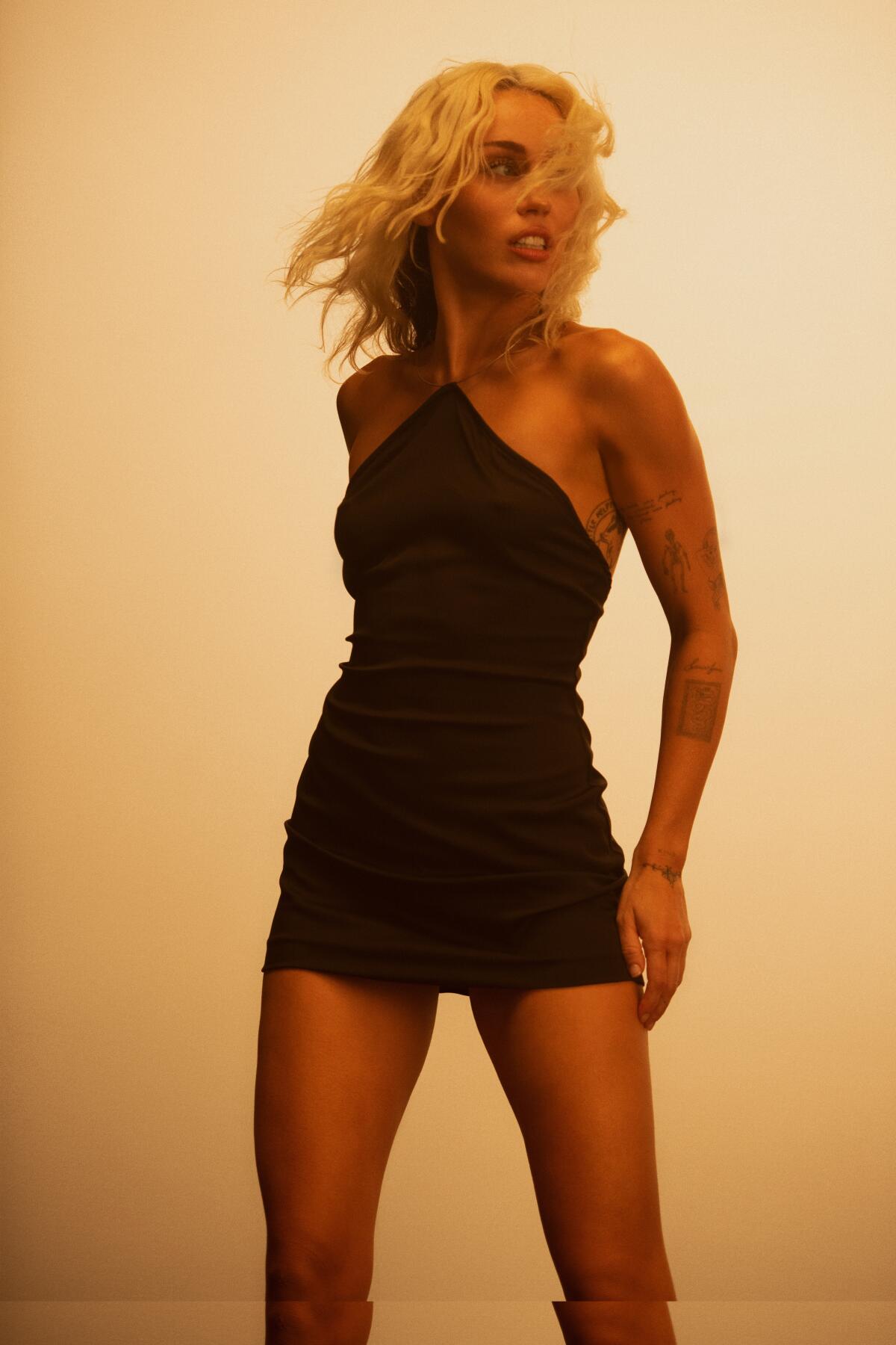 miley cyrus short black dress Celebrity-Inspired Little Black Dresses Are My Summer Essential