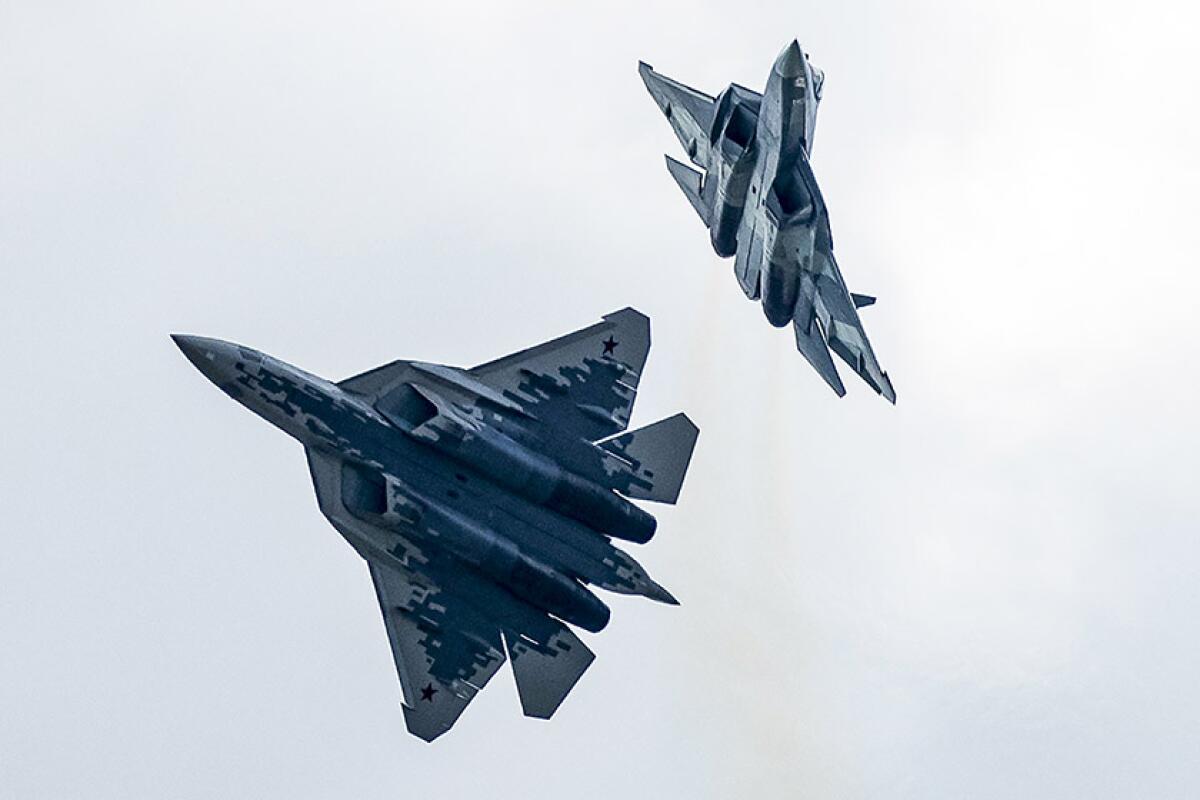 Russian Su-57 fighter jets are flown during an air show in Zhukovsky, Russia, on Aug. 27. The jet has stealth capability and carries sophisticated equipment and weapons.