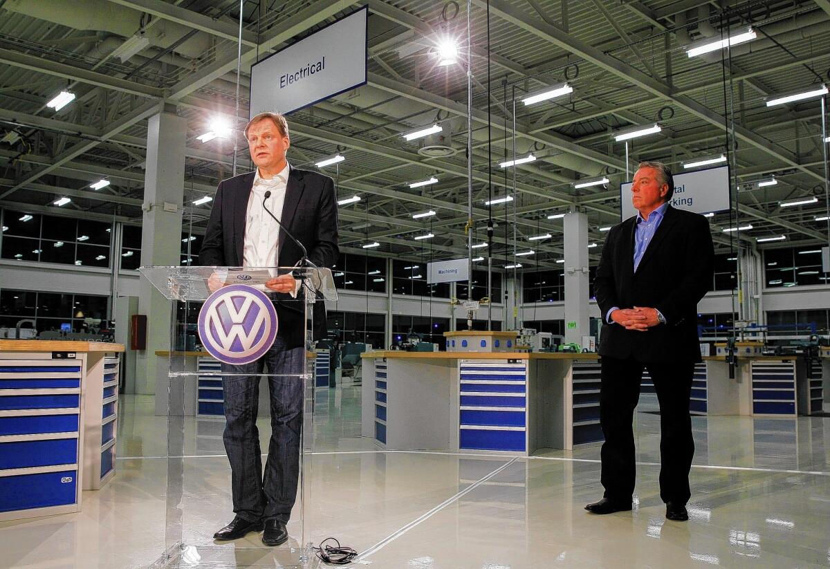 Frank Fischer, chairman and chief executive of the Volkswagen plant in Chattanooga, Tenn., speaks at a news conference Friday after workers rejected a unionization bid. At right is Gary Casteel, a regional director for the United Auto Workers union.