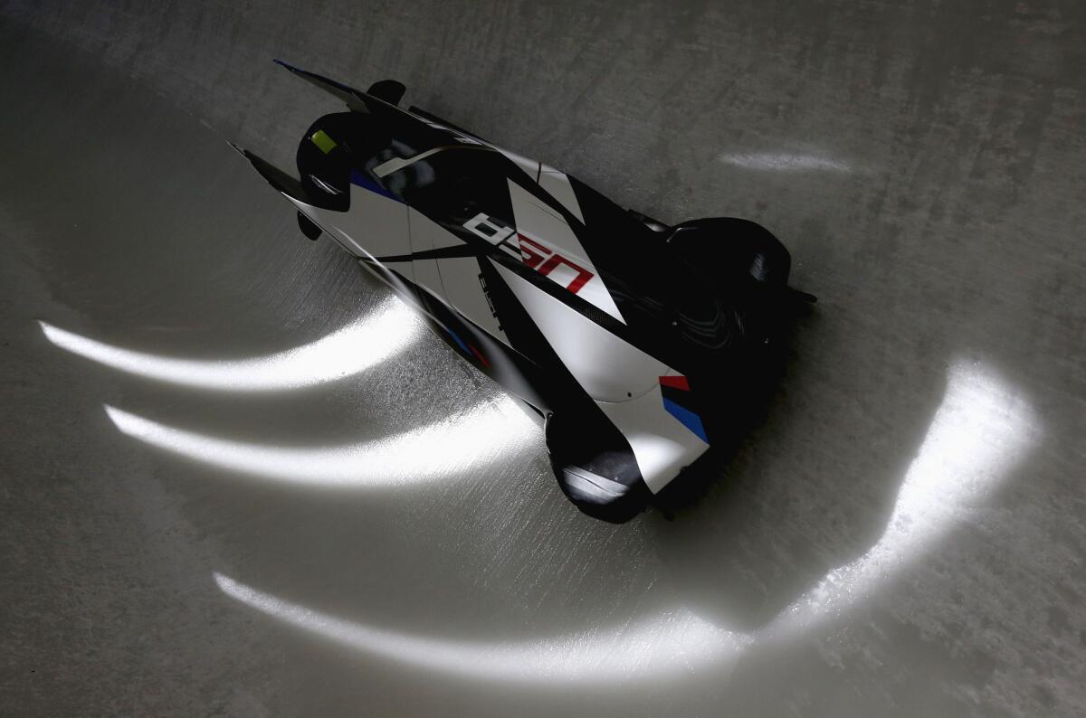 Jamie Greubel pilots the women's USA 2 bobsled during practice ahead of the Sochi 2014 Winter Olympics.