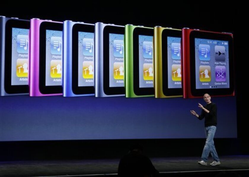 Apple CEO Steve Jobs discusses the features of the new Apple iPod Nano at a news conference in San Francisco, Wednesday, Sept. 1, 2010. (AP Photo/Paul Sakuma)