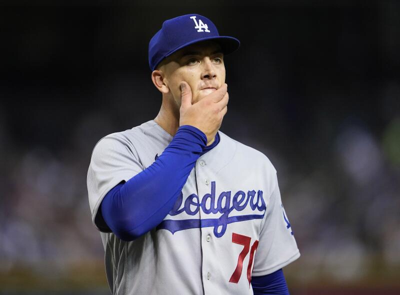 Bobby Miller walks to the dugout during a game against the Arizona Diamondbacks on Aug. 9.