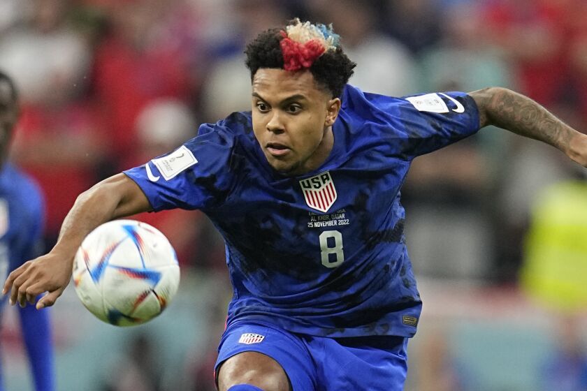 Weston McKennie of the United States looks the ball during the World Cup group B soccer match.