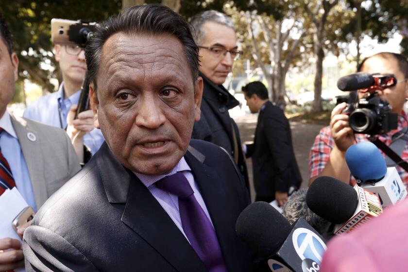 LOS ANGELES, CA - MAY 11, 2017 - Los Angeles City Councilman Gil Cedillo talks to media after addressing a news conference on Thursday May 11, 2017 to discuss a motion he will introduce Friday, which would require companies seeking contracts with the city to disclose if they are also submitting bids for President Donald Trump's border wall. (Al Seib / Los Angeles Times)