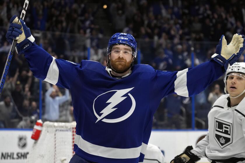 Tampa Bay Lightning defenseman Nick Perbix celebrates his game-winning goal in overtime during an NHL hockey game against the Los Angeles Kings Tuesday, Jan. 9, 2024, in Tampa, Fla. (AP Photo/Chris O'Meara)
