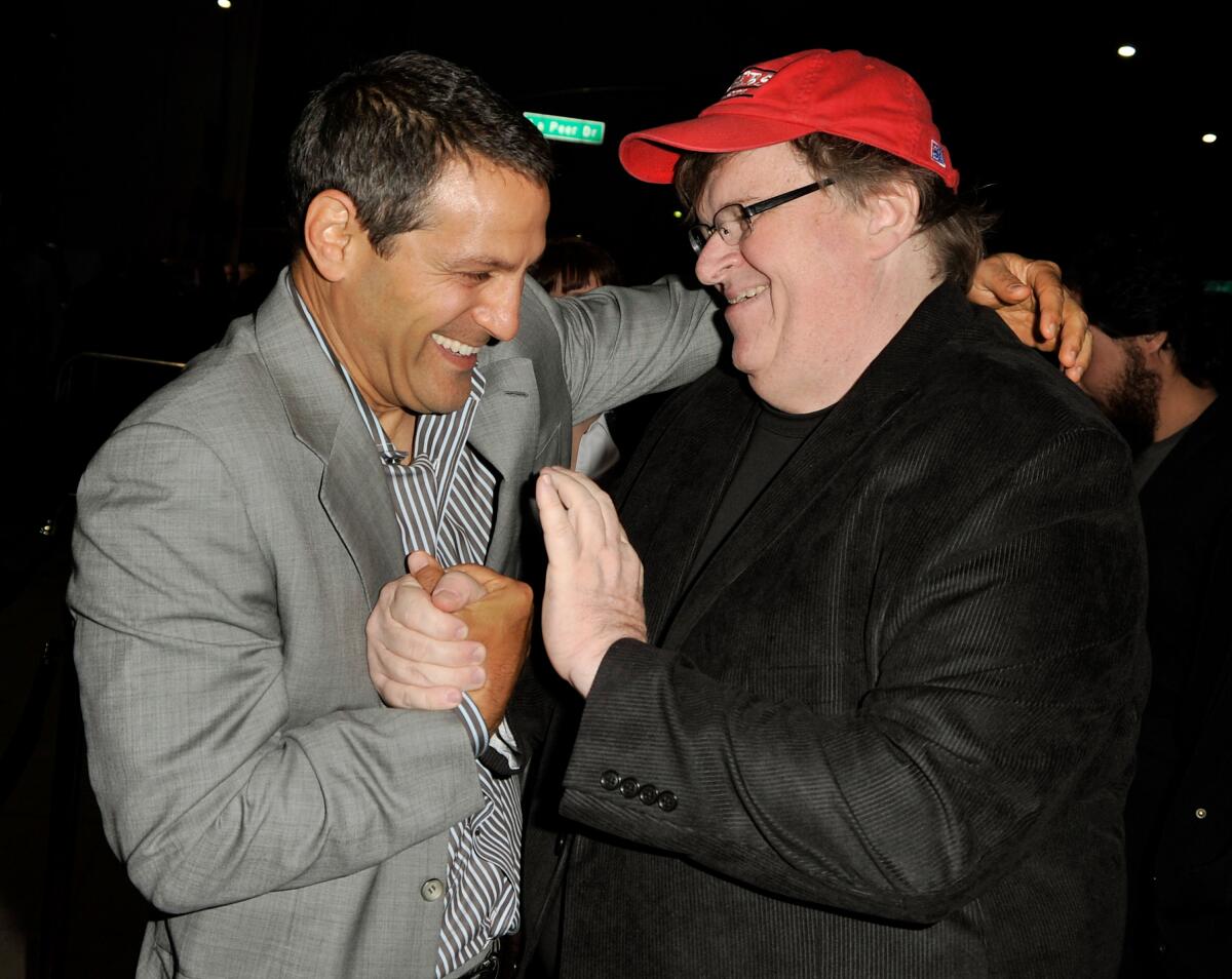 Ari Emanuel and Michael Moore at the L.A. premiere of Moore's film "Capitalism: A Love Story" in 2009. Emanuel in 2004 fought to get Moore's "Fahrenheit 9/11" distributed.