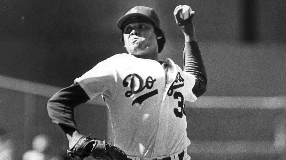 Fernando Valenzuela delivers a pitch for the Dodgers during a game in April 1984.