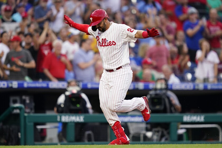 Philadelphia Phillies' Darick Hall reacts after hitting a home run against St. Louis Cardinals pitcher Miles Mikolas during the sixth inning of a baseball game, Friday, July 1, 2022, in Philadelphia. (AP Photo/Matt Slocum)