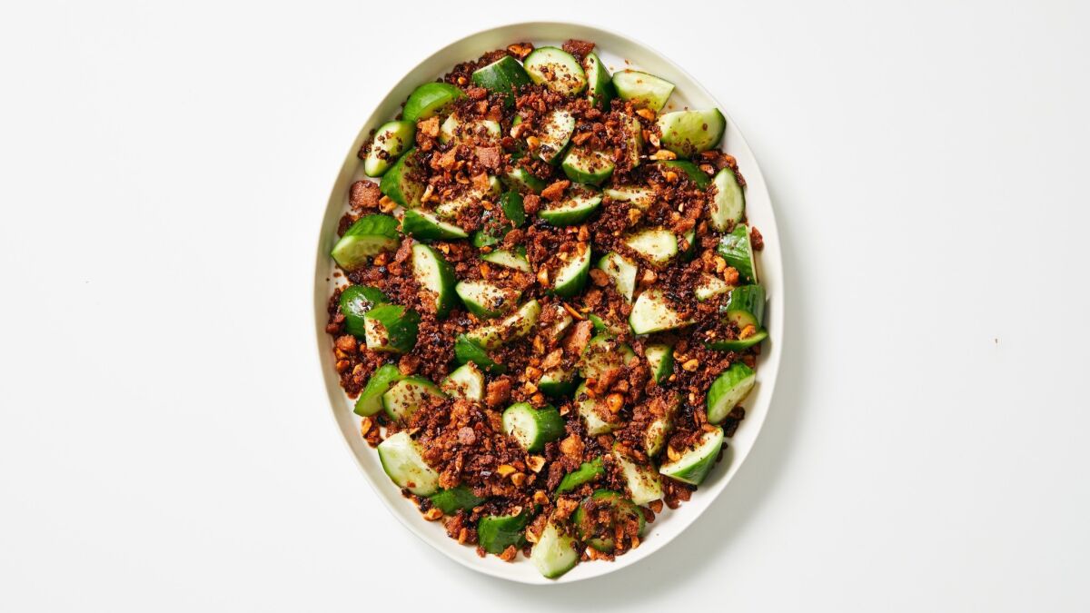 Cold chunks of cucumber are the perfect canvas for a sprinkling of crunchy, fried breadcrumbs flavored with ginger, garlic, peanuts and Szechuan pepper.