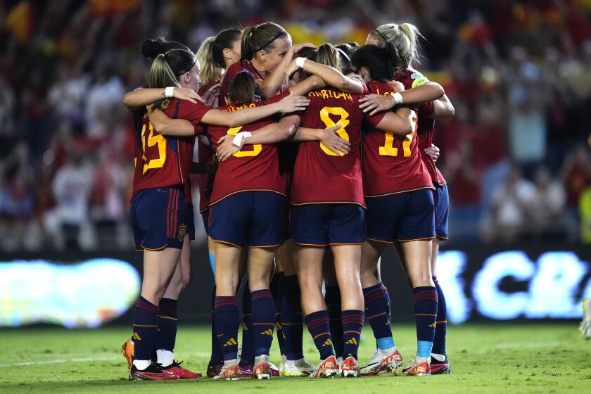 Spain's players celebrate a goal against Switzerland during the women's Nations League group D soccer match between Spain and Switzerland at the Nuevo Arcangel stadium in Cordoba, Spain, Tuesday, Sept. 26, 2023. (AP Photo/Jose Breton)