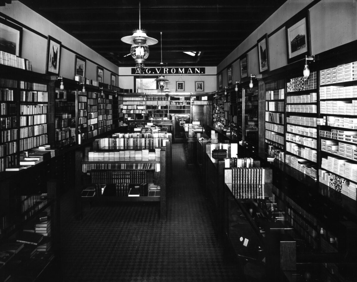 A black-and-white photo of inside a bookstore.