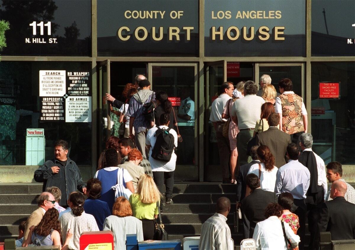 People line up to enter Los Angeles County Superior Court. The state Senate voted Monday to allow noncitizens to serve on juries.