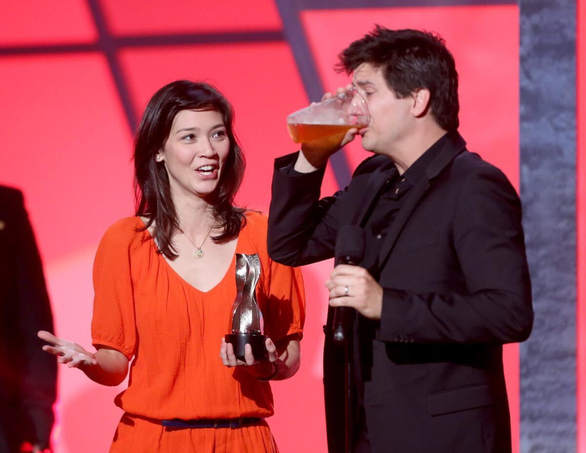 Erica Oyama and Ken Marino, accepting an award for online comedy series, have been signed to adapt a certain not-safe-for childrens' book for the big screen.